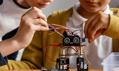 Children working with robotics