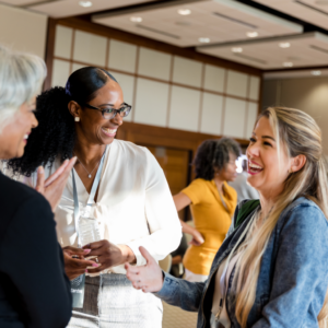 adult women chatting in a circle