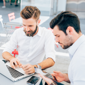 two men working together