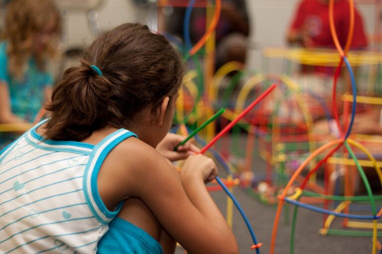 Young learner engaged in hands-on learning.