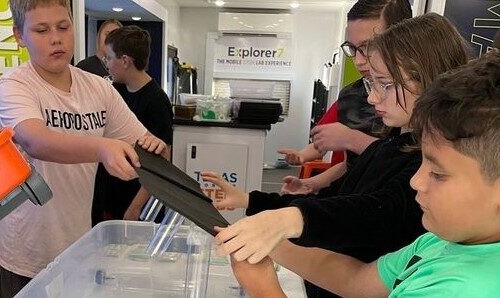 Texas EcosySTEM students engaging in STEM activities